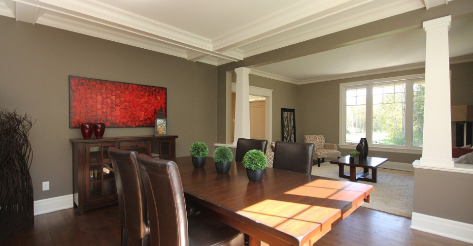 elegant dining room with living room in the background